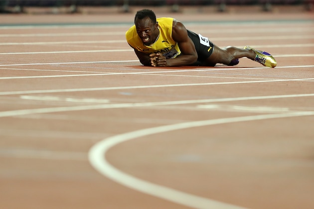 LONDON, ENGLAND - AUGUST 12: Usain Bolt of Jamaica falls to the track in the Men's 4x100 Relay final during day nine of the 16th IAAF World Athletics Championships London 2017 at The London Stadium on August 12, 2017 in London, United Kingdom. (Photo by Richard Heathcote/Getty Images)