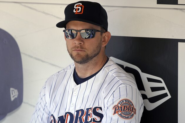 San Diego Padres manager Andy Green waits in the dugout before a baseball game against the Cincinnati Reds in San Diego, Wednesday, June 14, 2017. (AP Photo/Alex Gallardo)