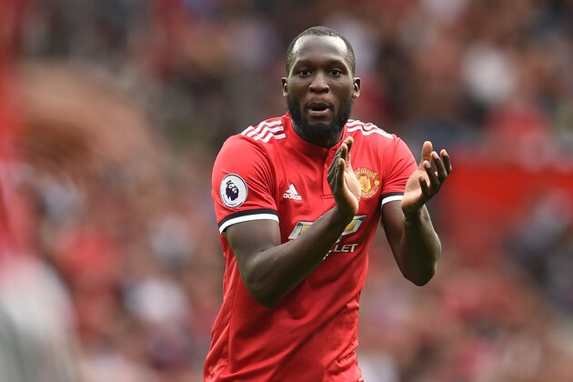 Manchester United's Belgian striker Romelu Lukaku applauds during the English Premier League football match between Manchester United and West Ham United at Old Trafford in Manchester, north west England, on August 13, 2017. / AFP PHOTO / Oli SCARFF / RESTRICTED TO EDITORIAL USE. No use with unauthorized audio, video, data, fixture lists, club/league logos or 'live' services. Online in-match use limited to 75 images, no video emulation. No use in betting, games or single club/league/player publications.  /         (Photo credit should read OLI SCARFF/AFP/Getty Images)