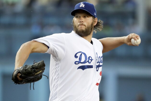 Los Angeles Dodgers starting pitcher Clayton Kershaw throws to the Colorado Rockies during the first inning of a baseball game in Los Angeles, Saturday, June 24, 2017. (AP Photo/Chris Carlson)