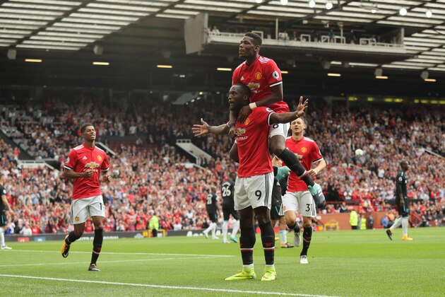 MANCHESTER, ENGLAND - AUGUST 13: Romelu Lukaku of Manchester United celebrates after scoring a goal to make it 2-0 during the Premier League match between Manchester United and West Ham United at Old Trafford on August 13, 2017 in Manchester, England. (Photo by Matthew Ashton - AMA/Getty Images)