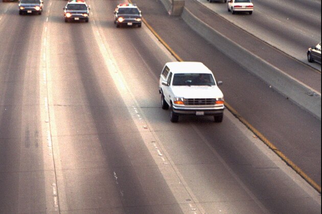 **ADVANCE FOR MONDAY, July 30 - FILE ** A white Ford Bronco, driven by Al Cowlings and carrying O.J. Simpson, is chased by police cars as it travels on a southern California freeway in Los Angeles in this June 17, 1994, file photo. The Los Angeles area was ground zero for the 1990s debate over police chases.  Restrictions now used in many police agencies on  chases started gaining steam in the mid-1990s when, many officers acknowledge, chases were a seldom-questioned part of police culture.(AP Photo/Joseph Villarin)
