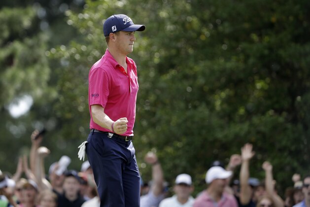 Justin Thomas celebrates after a birdie on the ninth hole during the final round of the PGA Championship golf tournament at the Quail Hollow Club Sunday, Aug. 13, 2017, in Charlotte, N.C. (AP Photo/Chris O'Meara)