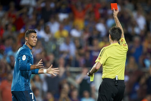 BARCELONA, SPAIN - AUGUST 13:  Cristiano Ronaldo of Real Madrid reacts after a red card during the Supercopa de Espana Supercopa Final 1st Leg match between FC Barcelona and Real Madrid at Camp Nou on August 13, 2017 in Barcelona, Spain.  (Photo by fotopress/Getty Images)
