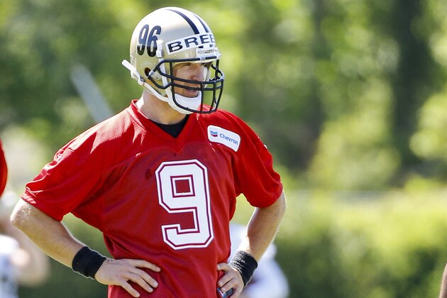 New Orleans Saints quarterback Drew Brees (9) is seen with a 96 sticker on his helmet to honor former NFL hall of fame player Cortez Kennedy who passed away this week. All the players wore the sticker on the left side of their helmets during an NFL football practice in Metairie, La., Thursday, May 25, 2017. (AP Photo/Derick E. Hingle) New Orleans Saints quarterback Drew Brees (9) is seen with a 96 sticker on his helmet to honor former NFL hall of fame player Cortez Kennedy who passed away this week. All the players wore the sticker on the left side of their helmets during an NFL football practice in Metairie, La., Thursday, May 25, 2017. (AP Photo/Derick E. Hingle)