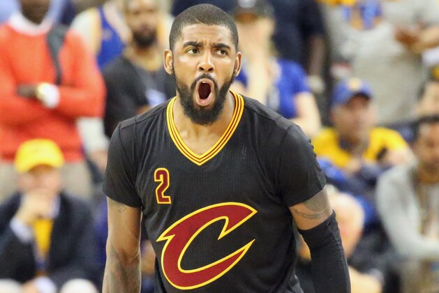 OAKLAND, CA - JUNE 12:  Kyrie Irving #2 of the Cleveland Cavaliers celebrates during the game against the Golden State Warriors in Game Five of the 2017 NBA Finals on June 12, 2017 at ORACLE Arena in Oakland, California. NOTE TO USER: User expressly acknowledges and agrees that, by downloading and or using this photograph, user is consenting to the terms and conditions of Getty Images License Agreement. Mandatory Copyright Notice: Copyright 2017 NBAE (Photo by Bruce Yeung/NBAE via Getty Images)