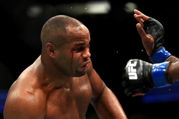 ANAHEIM, CA - JULY 29:  Daniel Cormier (L)  fights Jon Jones in the Light Heavyweight title bout  during UFC 214 at Honda Center on July 29, 2017 in Anaheim, California.  (Photo by Sean M. Haffey/Getty Images)