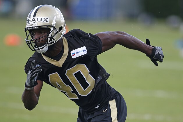 New Orleans Saints cornerback Delvin Breaux (40) goes through drills during NFL football practice in Metairie, La., Thursday, June 15, 2017. (AP Photo/Gerald Herbert)