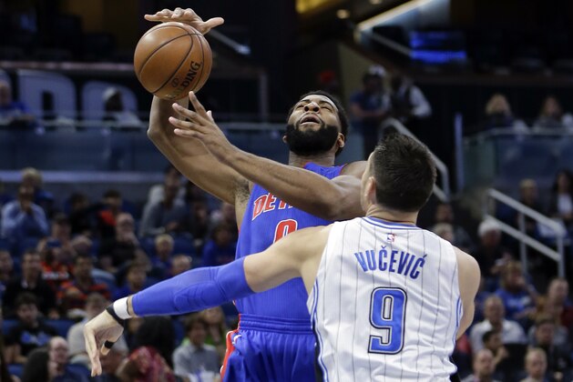 Detroit Pistons' Andre Drummond, left, momentarily loses control of the ball while going up to shoot against Orlando Magic's Nikola Vucevic (9) during the first half of an NBA basketball game, Friday, March 24, 2017, in Orlando, Fla. (AP Photo/John Raoux) Detroit Pistons' Andre Drummond, left, momentarily loses control of the ball while going up to shoot against Orlando Magic's Nikola Vucevic (9) during the first half of an NBA basketball game, Friday, March 24, 2017, in Orlando, Fla. (AP Photo/John Raoux)