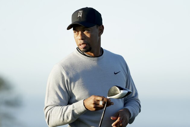 Tiger Woods holds his TaylorMade driver before hitting his tee shot on the fifth hole of the north course during the Pro-Am event of the Farmers Insurance Open golf tournament Wednesday, Jan. 25, 2017, in San Diego. Tiger Woods has added another equipment endorsement deal by signing with TaylorMade on Wednesday to play everything except the golf ball and the putter. Woods was open to shop around when Nike decided last year to get out of the hard equipment business. (AP Photo/Gregory Bull)