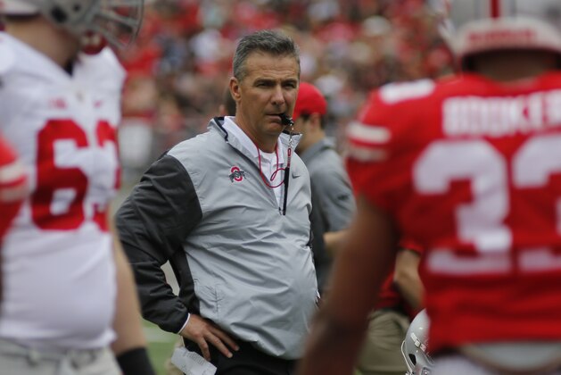 Ohio State head coach Urban Meyer watches from behind the line of scrimmage during their NCAA college spring football game Saturday, April 15, 2017, in Columbus, Ohio. (AP Photo/Jay LaPrete)