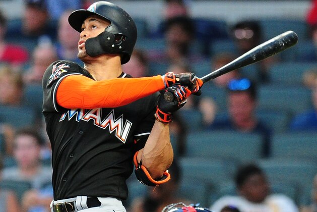 ATLANTA, GA - AUGUST 5: Giancarlo Stanton #27 of the Miami Marlins hits a sixth inning solo home run against the Atlanta Braves at SunTrust Park on August 5, 2017 in Atlanta, Georgia. (Photo by Scott Cunningham/Getty Images)