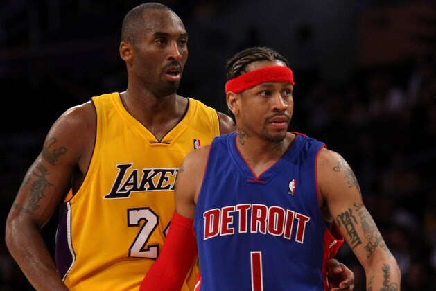 LOS ANGELES, CA - NOVEMBER 14:  Kobe Bryant #24 of the Los Angeles Lakers and Allen Iverson #1 of the Detroit Pistons get set for play on November 14, 2008 at Staples Center in Los Angeles, California. The Pistons won 106-95.   NOTE TO USER: User expressly acknowledges and agrees that, by downloading and/or using this Photograph, user is consenting to the terms and conditions of the Getty Images License Agreement.  (Photo by Stephen Dunn/Getty Images)