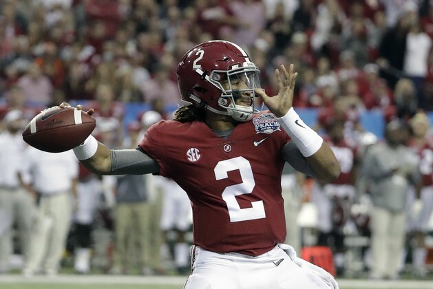 FILE - In this Dec. 31, 2016, file photo, Alabama quarterback Jalen Hurts (2) passes against Washington during the first half of the Peach Bowl NCAA college football playoff game,in Atlanta. The Southeastern Conference has had scant starpower _ and no high draft picks _ at quarterback the past couple of seasons. No Matthew Staffords or Cam Newtons, even Dak Prescott came out of nowhere. Now, Alabama's Jalen Hurts headlines a crop of promising young passers hoping to change that.  (AP Photo/David Goldman, File)
