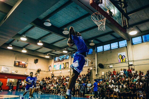 Aidan Igiehon goes up strong for a two-hand dunk. Aidan Igiehon goes up strong for a two-hand dunk.