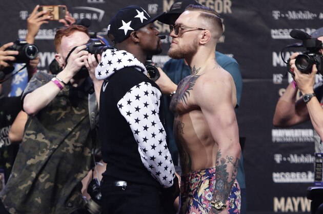Floyd Mayweather Jr., left, and Conor McGregor exchange words during a news conference at Barclays Center on Thursday, July 13, 2017, in New York. (AP Photo/Frank Franklin II) Floyd Mayweather Jr., left, and Conor McGregor exchange words during a news conference at Barclays Center on Thursday, July 13, 2017, in New York. (AP Photo/Frank Franklin II)