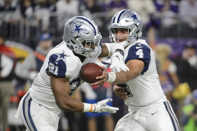MINNEAPOLIS, MN - DECEMBER 1: Dak Prescott #4 of the Dallas Cowboys hands off the ball to teammate Ezekiel Elliott #21 against the Minnesota Vikings during the game on December 1, 2016 at US Bank Stadium in Minneapolis, Minnesota. (Photo by Hannah Foslien/Getty Images)