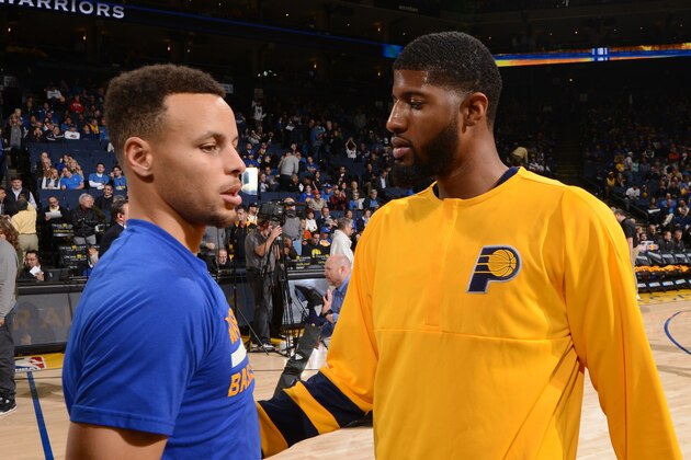 OAKLAND, CA - DECEMBER 5:  Stephen Curry #30 of the Golden State Warriors and Paul George #13 of the Indiana Pacers before the game against the Indiana Pacers on December 5, 2016 at ORACLE Arena in Oakland, California. NOTE TO USER: User expressly acknowledges and agrees that, by downloading and or using this photograph, user is consenting to the terms and conditions of Getty Images License Agreement. Mandatory Copyright Notice: Copyright 2016 NBAE (Photo by Noah Graham/NBAE via Getty Images)