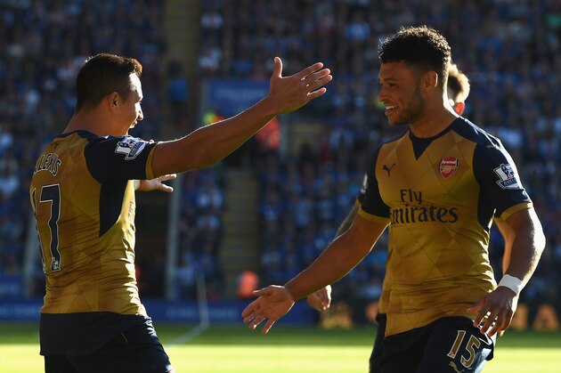 LEICESTER, ENGLAND - SEPTEMBER 26:  Alexis Sanchez (L) of Arsenal celebrates scoring his team's fourth and his hat trick goal with his team mate Alex Oxlade-Chamberlain (R)during the Barclays Premier League match between Leicester City and Arsenal at The King Power Stadium on September 26, 2015 in Leicester, United Kingdom.  (Photo by Ross Kinnaird/Getty Images)