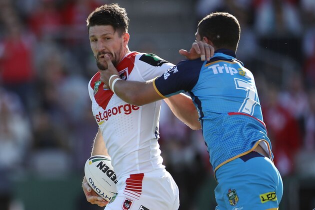 SYDNEY, AUSTRALIA - AUGUST 12: Gareth Widdop of the Dragons is tackled by Ashley Taylor of the Titans during the round 23 NRL match between the St George Illawarra Dragons and the Gold Coast Titans at UOW Jubilee Oval on August 12, 2017 in Sydney, Australia. (Photo by Mark Kolbe/Getty Images) SYDNEY, AUSTRALIA - AUGUST 12: Gareth Widdop of the Dragons is tackled by Ashley Taylor of the Titans during the round 23 NRL match between the St George Illawarra Dragons and the Gold Coast Titans at UOW Jubilee Oval on August 12, 2017 in Sydney, Australia. (Photo by Mark Kolbe/Getty Images)