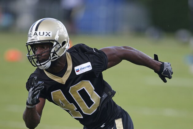 New Orleans Saints cornerback Delvin Breaux (40) goes through drills during NFL football practice in Metairie, La., Thursday, June 15, 2017. (AP Photo/Gerald Herbert)