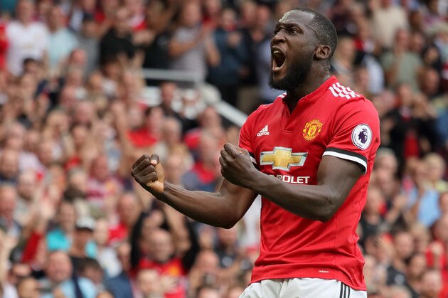 MANCHESTER, ENGLAND - AUGUST 13: Romelu Lukaku of Manchester United celebrates after scoring a goal to make it 1-0 during the Premier League match between Manchester United and West Ham United at Old Trafford on August 13, 2017 in Manchester, England. (Photo by Matthew Ashton - AMA/Getty Images)