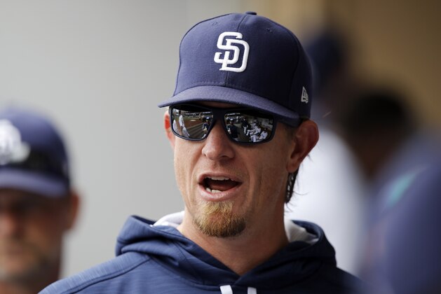 San Diego Padres' Jered Weaver talks in the dugout before the first inning of a baseball game against the Chicago Cubs in San Diego, Wednesday, May 31, 2017. (AP Photo/Alex Gallardo)
