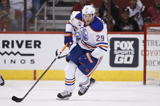 Edmonton Oilers center Leon Draisaitl (29) skates with the puck against the Arizona Coyotes during the first period of an NHL hockey game Friday, Nov. 25, 2016, in Glendale, Ariz.  The Coyotes defeated the Oilers 3-2 in a shootout. (AP Photo/Ross D. Franklin)