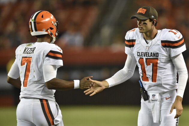 Cleveland Browns quarterback Brock Osweiler (17) congratulates quarterback DeShone Kizer after a Browns touchdown during the second half of an NFL preseason football game against the New Orleans Saints on Thursday, Aug. 10, 2017, in Cleveland. (AP Photo/David Richard)