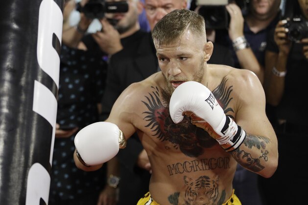Conor McGregor trains during a media workout Friday, Aug. 11, 2017, in Las Vegas. McGregor is scheduled to fight Floyd Mayweather Jr. in a boxing match Aug. 26 in Las Vegas. (AP Photo/John Locher)