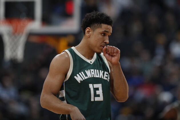 Milwaukee Bucks guard Malcolm Brogdon (13) in the first half of an NBA basketball game Friday, Feb. 3, 2017, in Denver. (AP Photo/David Zalubowski)
