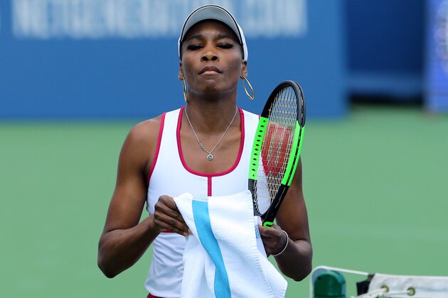 Aug 16, 2017; Mason, OH, USA; Venus Williams (USA) reacts during a stop in play against Ashleigh Barty (AUS) during the Western and Southern Open at the Lindner Family Tennis Center. Mandatory Credit: Aaron Doster-USA TODAY Sports
