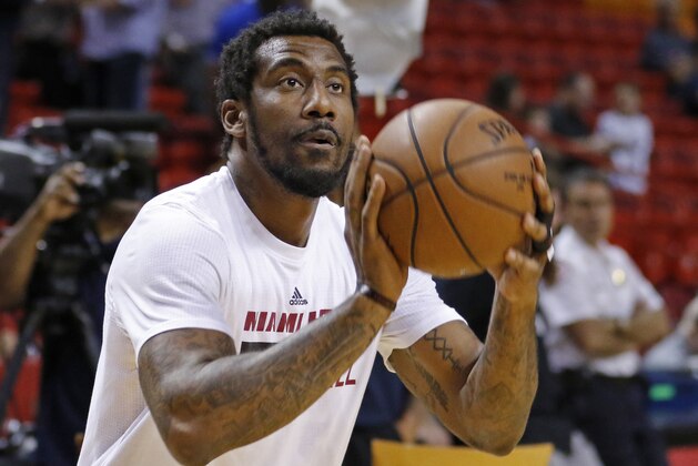 FILE - In this March 28, 2016, file photo, Miami Heat forward Amar'e Stoudemire shoots during warmups before the Heat met the Brooklyn Nets in an NBA basketball game, in Miami. After retiring from the NBA on July 26, Stoudemire signed a two-year contract Monday, Aug. 1, 2016,  to play for Israeli team Hapoel Jerusalem. Stoudemire says it was a very emotional decision for him and his family.  (AP Photo/Joe Skipper, File)