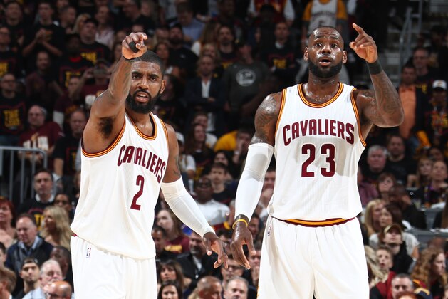 CLEVELAND, OH - JUNE 7:  Kyrie Irving #2 and LeBron James #23 of the Cleveland Cavaliers looks on during the game against the Golden State Warriors in Game Three of the 2017 NBA Finals on June 7, 2017 at Quicken Loans Arena in Cleveland, Ohio. NOTE TO USER: User expressly acknowledges and agrees that, by downloading and or using this photograph, user is consenting to the terms and conditions of Getty Images License Agreement. Mandatory Copyright Notice: Copyright 2017 NBAE (Photo by Nathaniel S. Butler/NBAE via Getty Images)