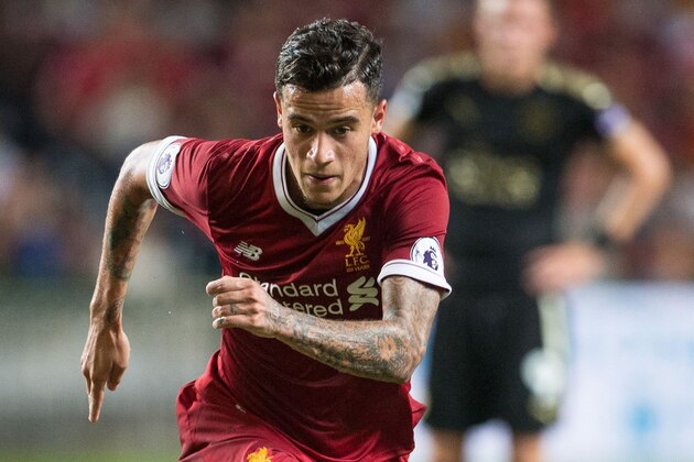 Liverpool's Philippe Coutinho controls the ball during the final of the Premier League Asia Trophy football tournament between Liverpool and Leicester City in Hong Kong on July 22, 2017. / AFP PHOTO / DALE DE LA REY / RESTRICTED TO EDITORIAL USE. No use with unauthorised audio, video, data, fixture lists, club/league logos or 'live' services. Online in-match use limited to 75 images, no video emulation. No use in betting, games or single club/league/player publications.        (Photo credit should read DALE DE LA REY/AFP/Getty Images)