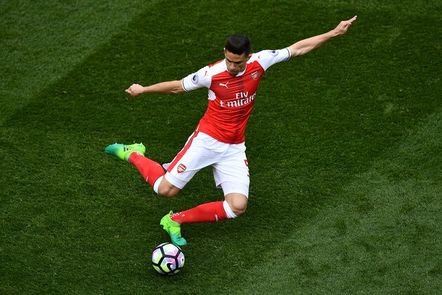 LONDON, ENGLAND - APRIL 30:  Gabriel Paulista of Arsenal lines up a pass during the Premier League match between Tottenham Hotspur and Arsenal at White Hart Lane on April 30, 2017 in London, England. (Photo by Dan Mullan/Getty Images)