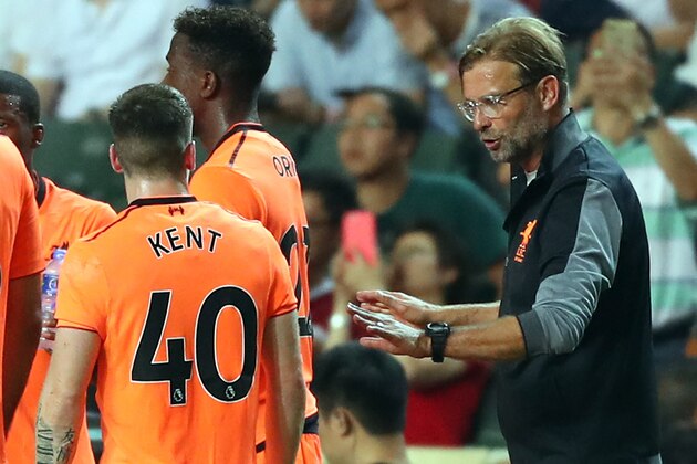 HONG KONG - JULY 19:  Jurgen Klopp Manager of Liverpool speaks to Ryan Kent during the Premier League Asia Trophy match between Liverpool and Crystal Palace at Hong Kong Stadium on July 19, 2017 in Hong Kong, Hong Kong.  (Photo by Stanley Chou/Getty Images)