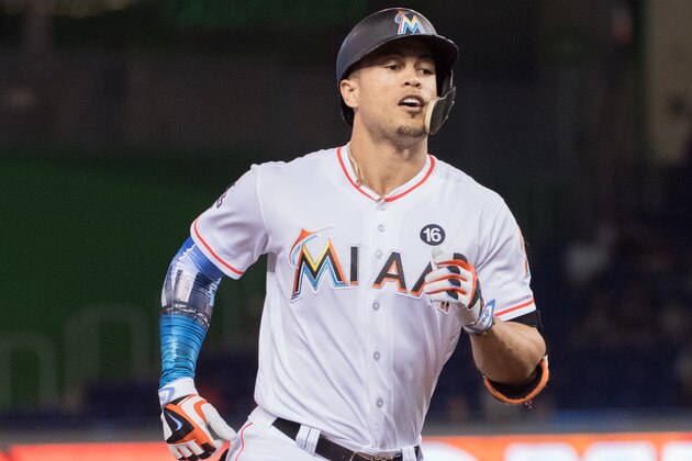 MIAMI, FL - AUGUST 14: Giancarlo Stanton #27 of the Miami Marlins hits his record breaking 43rd homerun of the season during the game between the Miami Marlins and the San Francisco Giants at Marlins Park on August 14, 2017 in Miami, Florida. (Photo by Mark Brown/Getty Images)