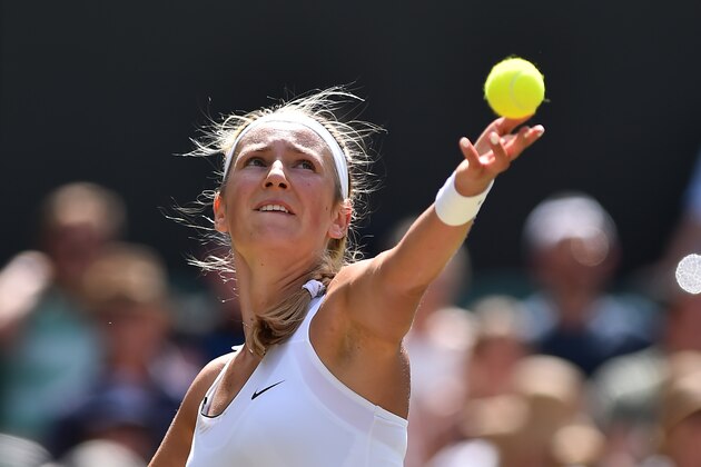 Belarus's Victoria Azarenka serves against Britain's Heather Watson during their women's singles third round match on the fifth day of the 2017 Wimbledon Championships at The All England Lawn Tennis Club in Wimbledon, southwest London, on July 7, 2017. / AFP PHOTO / Glyn KIRK / RESTRICTED TO EDITORIAL USE        (Photo credit should read GLYN KIRK/AFP/Getty Images)