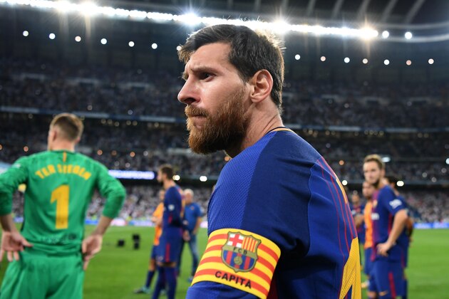 Barcelona's Argentinian forward Lionel Messi looks on after being defeated by Real Madrid at the end of the second leg of the Spanish Supercup football match Real Madrid vs FC Barcelona at the Santiago Bernabeu stadium in Madrid, on August 16, 2017. / AFP PHOTO / GABRIEL BOUYS        (Photo credit should read GABRIEL BOUYS/AFP/Getty Images)