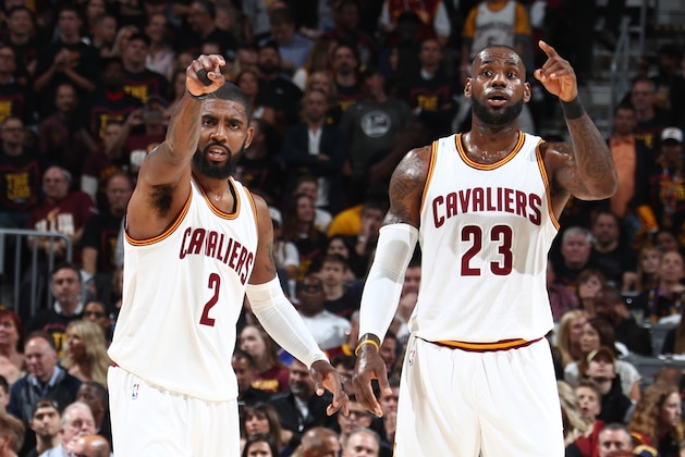 CLEVELAND, OH - JUNE 7:  Kyrie Irving #2 and LeBron James #23 of the Cleveland Cavaliers looks on during the game against the Golden State Warriors in Game Three of the 2017 NBA Finals on June 7, 2017 at Quicken Loans Arena in Cleveland, Ohio. NOTE TO USER: User expressly acknowledges and agrees that, by downloading and or using this photograph, user is consenting to the terms and conditions of Getty Images License Agreement. Mandatory Copyright Notice: Copyright 2017 NBAE (Photo by Nathaniel S. Butler/NBAE via Getty Images)