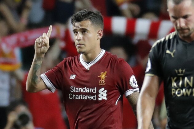 FILE - In this Saturday, July 22, 2017 file photo, Liverpool's Philippe Coutinho celebrates after scoring a goal during the final match against Leicester City FC at the Premier League Asia Trophy soccer tournament in Hong Kong. Liverpool’s American owners say Philippe Coutinho will not be sold in this transfer window, amid interest in the Brazil playmaker from Barcelona. In a short statement on Friday, Aug. 11, 2017, Fenway Sports Group say Liverpool’s “definitive stance is that no offers for Philippe will be considered.” (AP Photo/Kin Cheung, file)