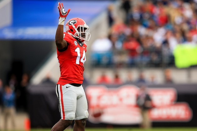 JACKSONVILLE, FL - JANUARY 02: Malkom Parrish #14 of the Georgia Bulldogs gestures during the TaxSlayer Bowl game against the Penn State Nittany Lions at EverBank Field on January 2, 2016 in Jacksonville, Florida.  (Photo by Rob Foldy/Getty Images)