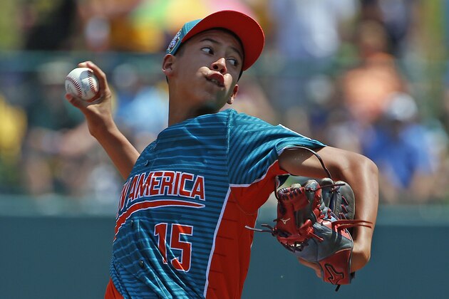 Venezuela pitcher Jonney Rosario delivers in the first inning of an International pool play baseball game against Mexico at the Little League World Series tournament in South Williamsport, Pa., Thursday, Aug. 17, 2017. (AP Photo/Gene J. Puskar)
