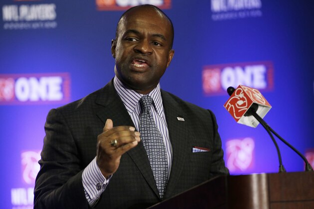 FILE - In this Jan., 2015, file photo, NFL Players Association Executive Director DeMaurice Smith speaks during a news conference for the NFL Super Bowl XLIX football game in Phoenix. Smith retained his position as executive director of the NFL players' union in voting Sunday by 32 player representatives. (AP Photo/David J. Phillip, File)