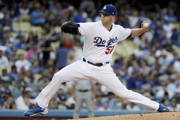 Los Angeles Dodgers starting pitcher Alex Wood throws against the Chicago White Sox during the first inning of a baseball game in Los Angeles, Tuesday, Aug. 15, 2017. (AP Photo/Chris Carlson)