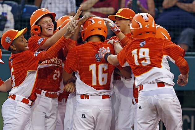 Lufkin, Texas' Hunter Ditsworth (16) is greeted by teammates after hitting a two-run home run off Grosse Pointe, Mich., pitcher Jack Jones during the third inning of a game in U.S. pool play at the Little League World Series in South Williamsport, Pa., Thursday, Aug. 17, 2017. (AP Photo/Gene J. Puskar) Lufkin, Texas' Hunter Ditsworth (16) is greeted by teammates after hitting a two-run home run off Grosse Pointe, Mich., pitcher Jack Jones during the third inning of a game in U.S. pool play at the Little League World Series in South Williamsport, Pa., Thursday, Aug. 17, 2017. (AP Photo/Gene J. Puskar)