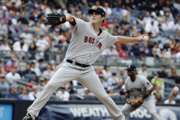 Boston Red Sox's Drew Pomeranz delivers a pitch during the first inning of a baseball game against the New York Yankees, Saturday, Aug. 12, 2017, in New York. (AP Photo/Frank Franklin II)