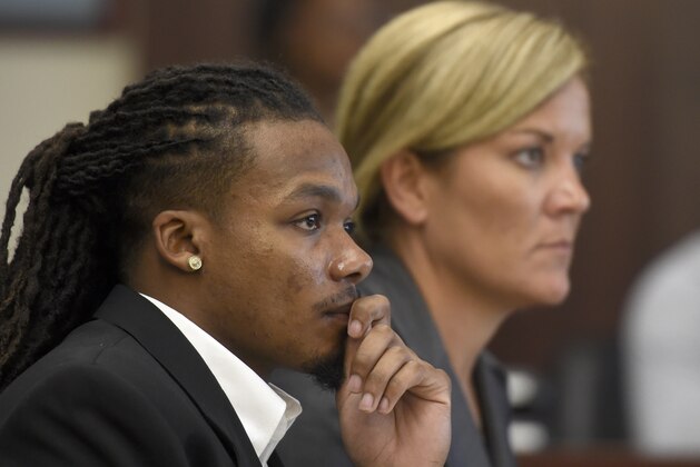 Brandon E. Banks and his attorney Katie Hagan listen during the Vanderbilt rape case trial at Justice A. A. Birch Building Monday, June 19, 2017, in Nashville, Tenn. Banks is charged with five counts of aggravated rape and two counts of aggravated sexual battery.  (Lacy Atkins/The Tennessean via AP, Pool)