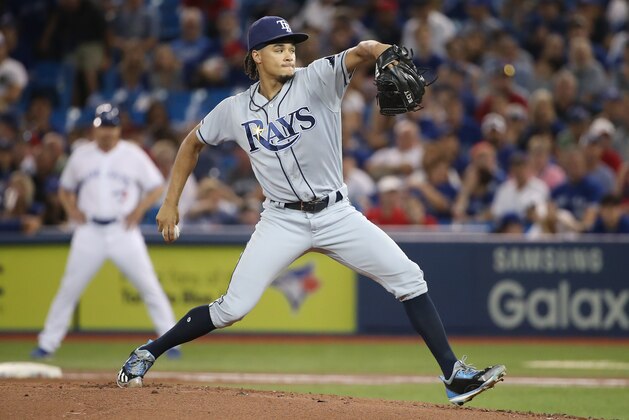 TORONTO, ON - AUGUST 17: Chris Archer #22 of the Tampa Bay Rays delivers a pitch in the first inning during MLB game action against the Toronto Blue Jays at Rogers Centre on August 17, 2017 in Toronto, Canada. (Photo by Tom Szczerbowski/Getty Images)